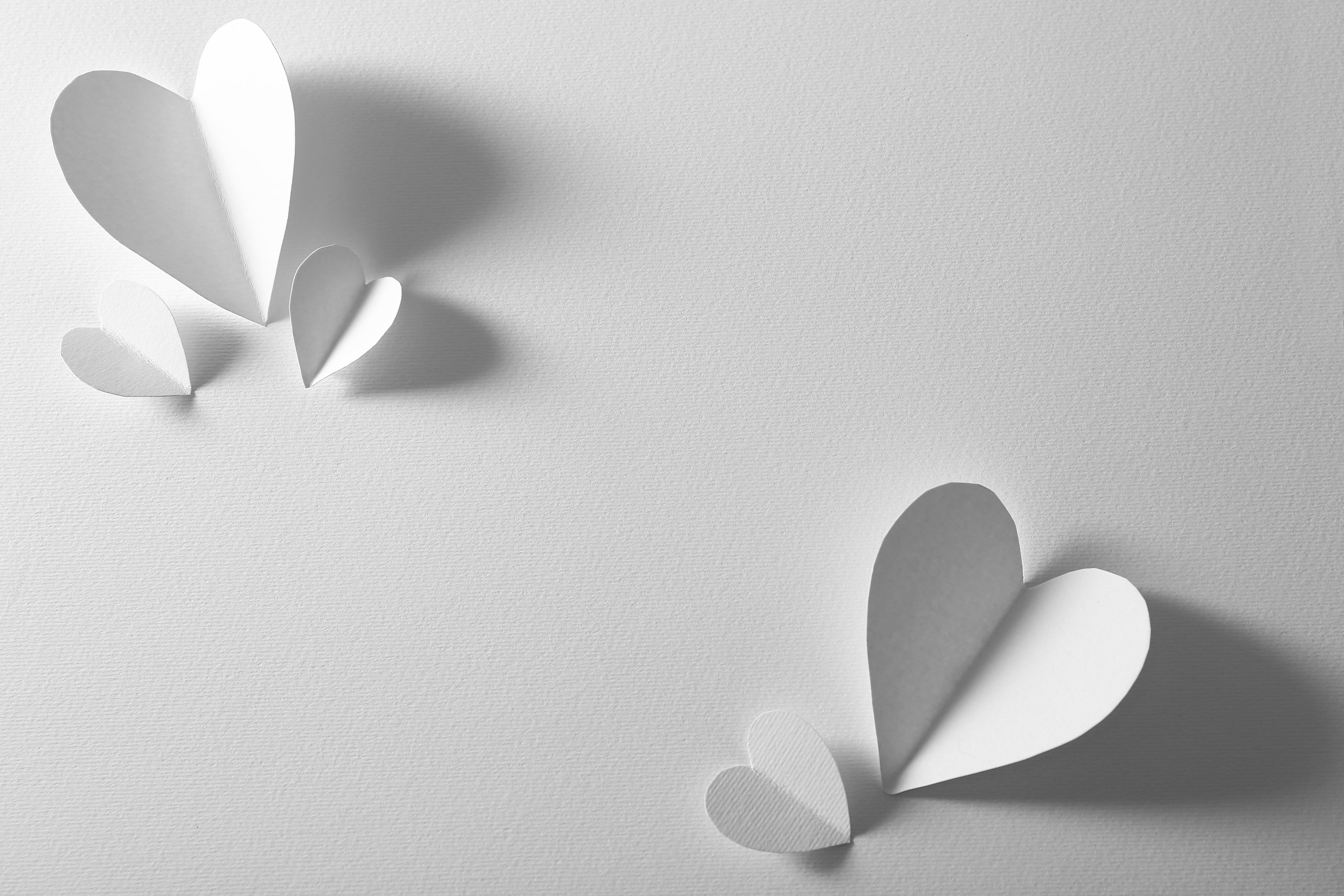 Paper Hearts on White Background